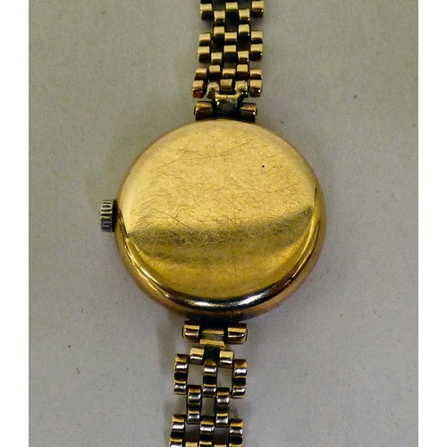 301 - A ladies Rotary 9ct gold cased and strapped wristwatch, faced by an Arabic dial  (approx. gross... 