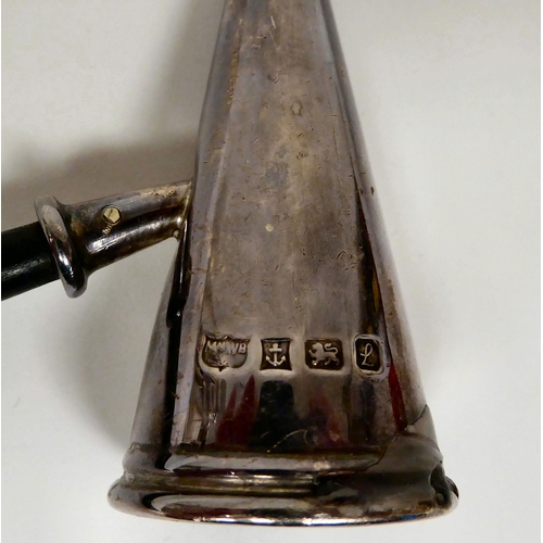 304 - A silver conical shape candle extinguisher, on a turned and ribbed, ebonised handle  Mappin & We... 