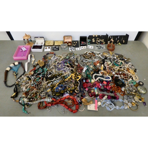 312 - Costume jewellery: to include bangles and coloured bead necklaces