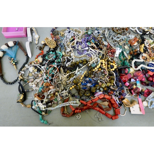 312 - Costume jewellery: to include bangles and coloured bead necklaces