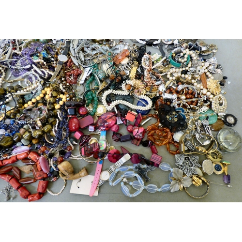 312 - Costume jewellery: to include bangles and coloured bead necklaces