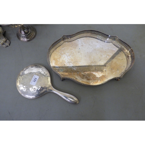 323 - 20thC metalware: to include a pair of Continental style silver plated comport stands  7