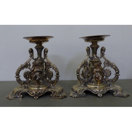 323 - 20thC metalware: to include a pair of Continental style silver plated comport stands  7