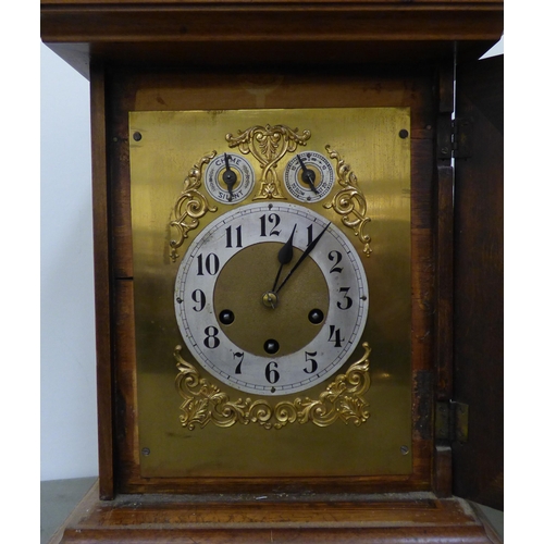 324 - An early 20thC Junghans mahogany cased mantel clock; the movement faced by an Arabic dial  18