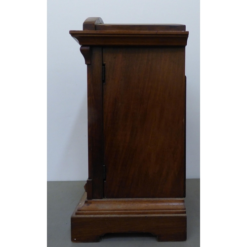 324 - An early 20thC Junghans mahogany cased mantel clock; the movement faced by an Arabic dial  18