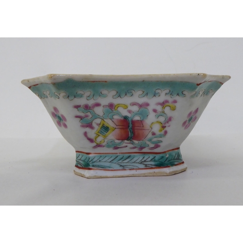 49 - A late 19thC Chinese porcelain shallow dish, decorated with flora, on a green ground  7