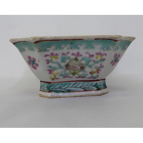 49 - A late 19thC Chinese porcelain shallow dish, decorated with flora, on a green ground  7