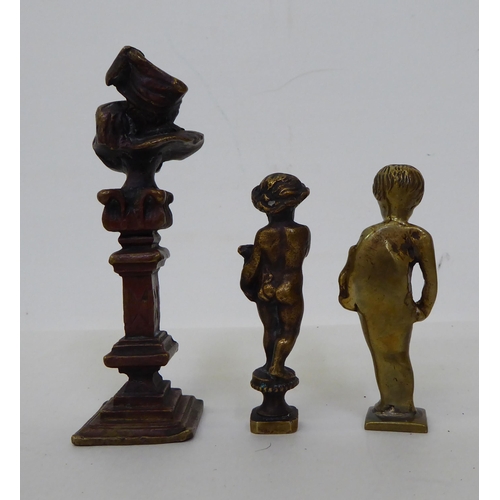 53 - 20thC collectables: to include two brass cherubic seals  3