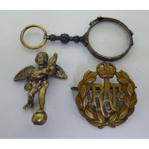 53 - 20thC collectables: to include two brass cherubic seals  3