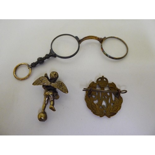 53 - 20thC collectables: to include two brass cherubic seals  3