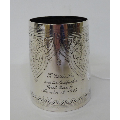 55 - A late Victorian silver mug  London 1891  (approx. weight 3.5ozs); and a loaded silver pin cushion s... 