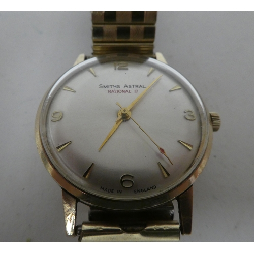 7 - A Smith Astral National.17 9ct gold cased manual wristwatch, faced by a baton and Arabic dial, on a ... 