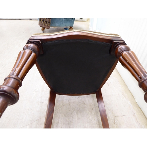 106 - A set of eight Victorian reproduction, mahogany framed, balloon back dining chairs, the brown fabric... 