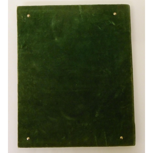 137 - A late 19thC green felt and brass clad folio set with a painted photographic portrait of a young lad... 