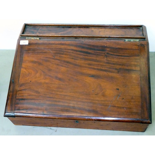 15 - A late Victorian mahogany clerk's desk with a hinged front, enclosing a pigeonhole and open section ... 