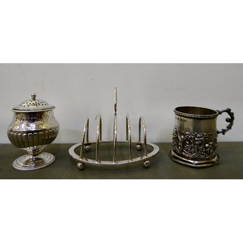 2 - Three silver items, viz. a toast rack; a pepper pot; and a mug  mixed assays & dates  (combined ... 