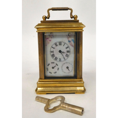 200 - A modern brass cased miniature carriage timepiece; the Roman dial on a porcelain plate with day and ... 