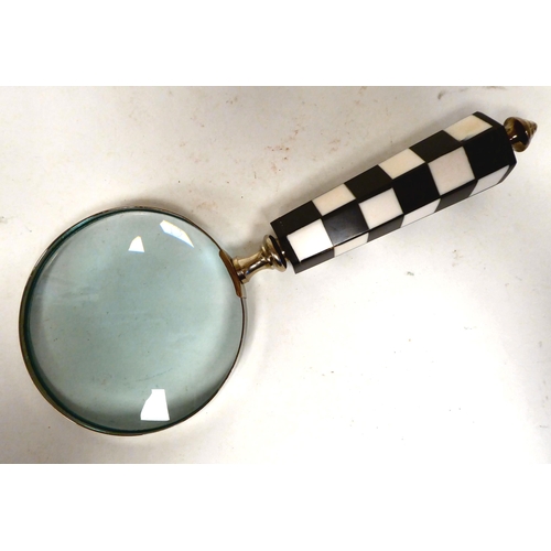 202 - A modern magnifying glass with a chequerboard pattern resin handle