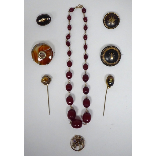 207 - Jewellery: to include a late Victorian yellow metal clover brooch, set with seed pearls and purple s... 