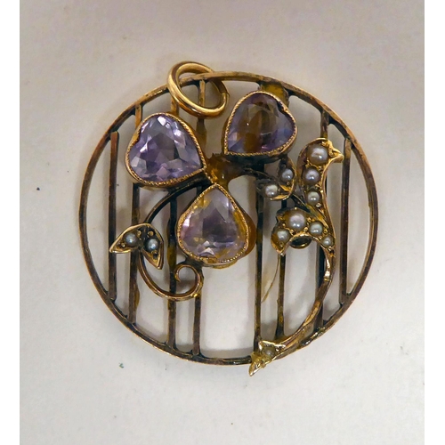 207 - Jewellery: to include a late Victorian yellow metal clover brooch, set with seed pearls and purple s... 