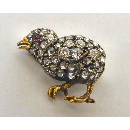 25 - A late Victorian brooch, fashioned as a bird, set with diamonds and a ruby