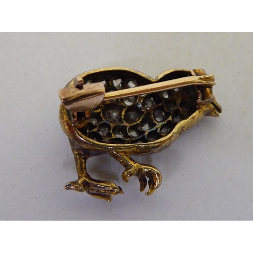 25 - A late Victorian brooch, fashioned as a bird, set with diamonds and a ruby