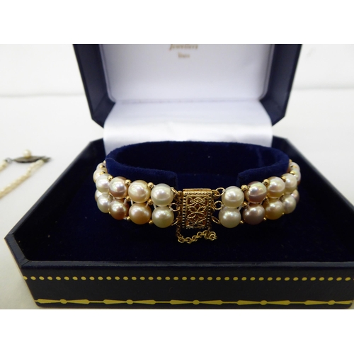 32 - Jewellery: to include a cultured pearl, double row bracelet, on a 14ct gold clasp