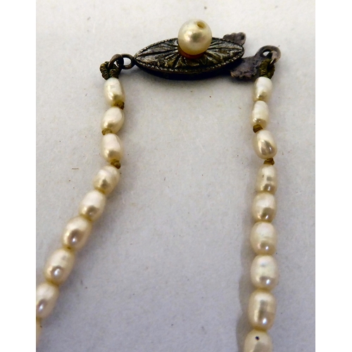 32 - Jewellery: to include a cultured pearl, double row bracelet, on a 14ct gold clasp