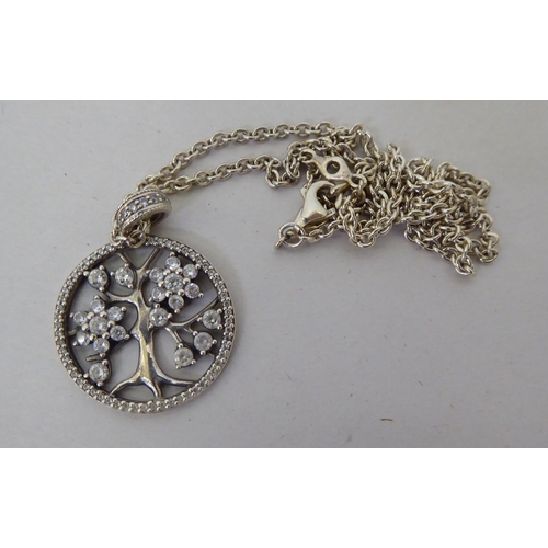 346 - Silver items of personal ornament: to include a passport pendant by Pandora