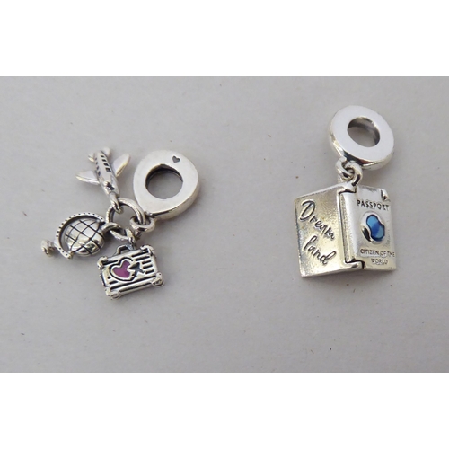 346 - Silver items of personal ornament: to include a passport pendant by Pandora