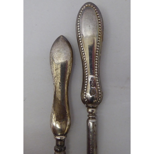 347 - Loaded silver handled and white metal items of personal ornament