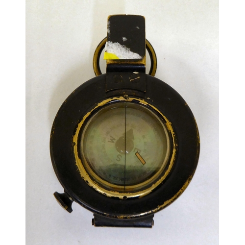 40 - A World War II Mark III compass No.818208, in a brown hide case(Please Note: this lot is subject to ... 