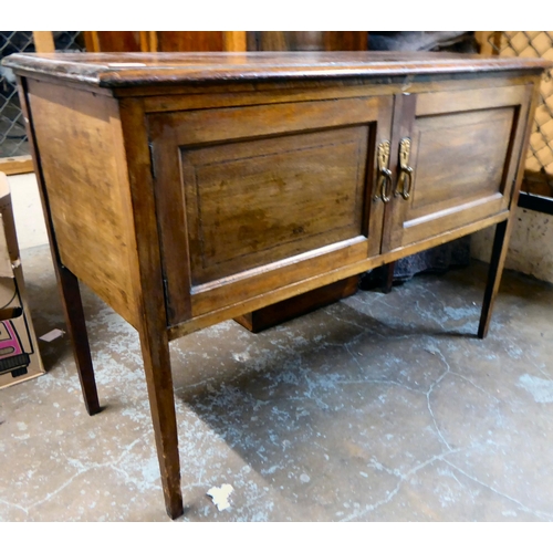 44 - An Edwardian stained beech and mahogany two door side cabinet, raised on square, tapered legs  ... 