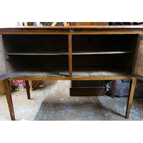 44 - An Edwardian stained beech and mahogany two door side cabinet, raised on square, tapered legs  ... 