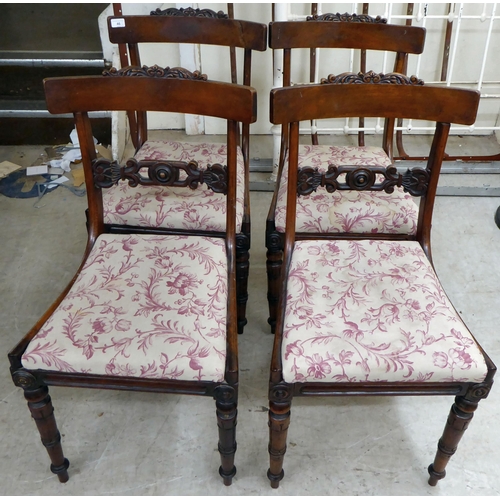 46 - A set of four early Victorian carved mahogany framed, bar back dining chairs, the later fabric uphol... 