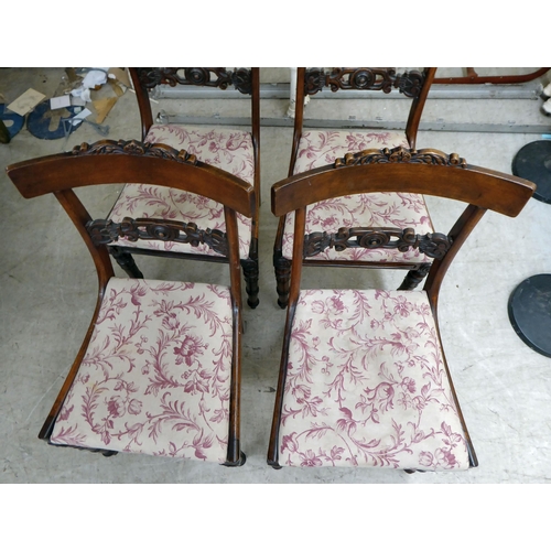 46 - A set of four early Victorian carved mahogany framed, bar back dining chairs, the later fabric uphol... 