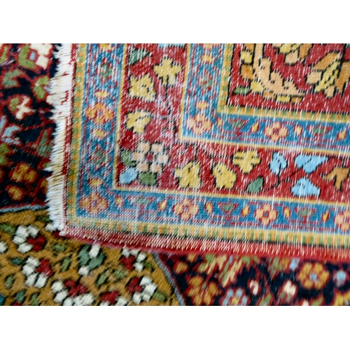 59 - Four dissimilar Persian and similar rugs, each individually decorated on multi-coloured grounds ... 