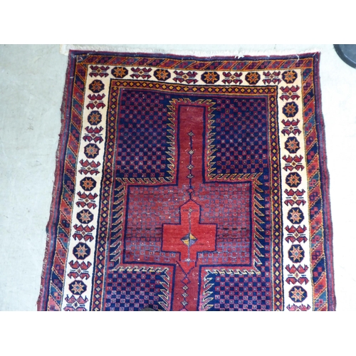 77 - An Afghan rug, on a multi-coloured ground  48