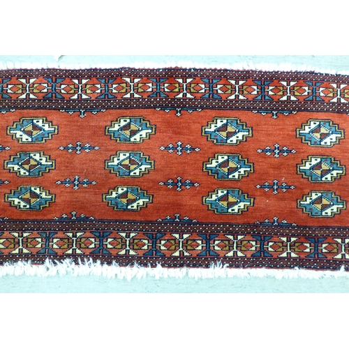 80 - Two Persian rugs, one decorated with floral designs, on a blue ground  24