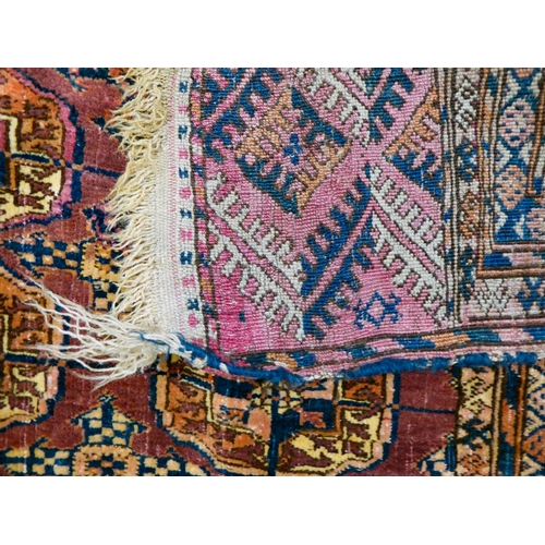 81 - A Turkoman rug, on a multi-coloured ground  56