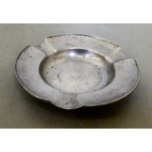 13 - Mainly 20thC metalware: to include bronze tokens; and pewter tableware