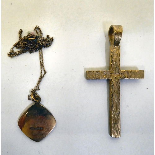 14 - A 9ct pendant cross; and a 9ct gold St Christopher pendant, on a fine chain