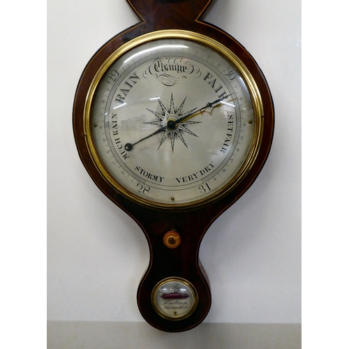 36 - An Edwardian string inlaid, mahogany cased wheel barometer  38