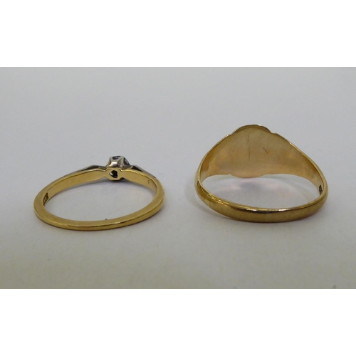 4 - A 9ct gold signet ring; and a 9ct gold solitaire ring, set with a central diamond