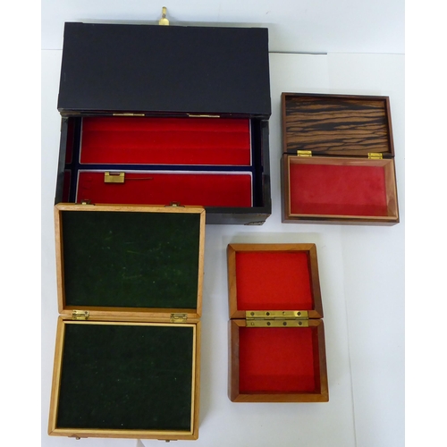 52 - Boxes: to include a modern Chinese fruitwood example, the hinged lid set with a carved mother-of-pea... 