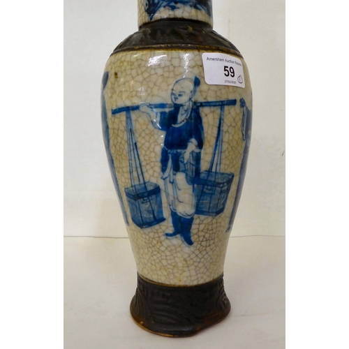 59 - A 20thC Chinese porcelain crackle glazed vase and cover, decorated with figures  12.5