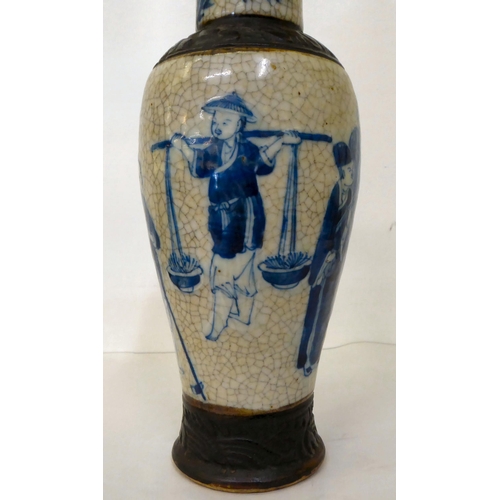 59 - A 20thC Chinese porcelain crackle glazed vase and cover, decorated with figures  12.5