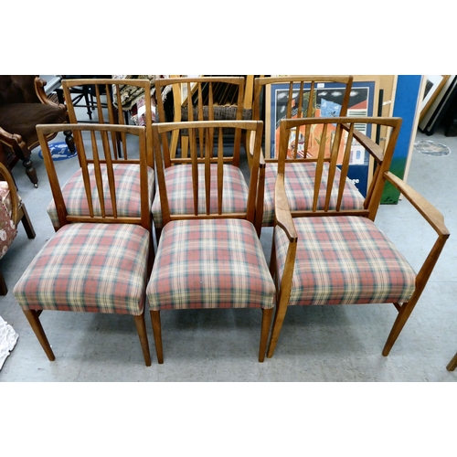 63 - A Gordon Russel teak dining table, raised on turned legs  30