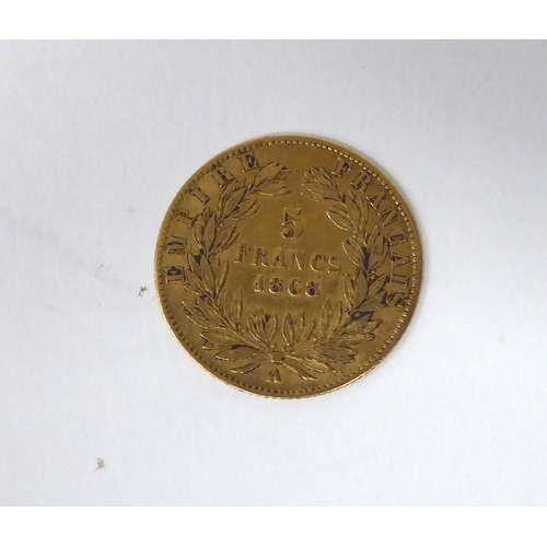 72 - An 1868 French 5 franc gold coin