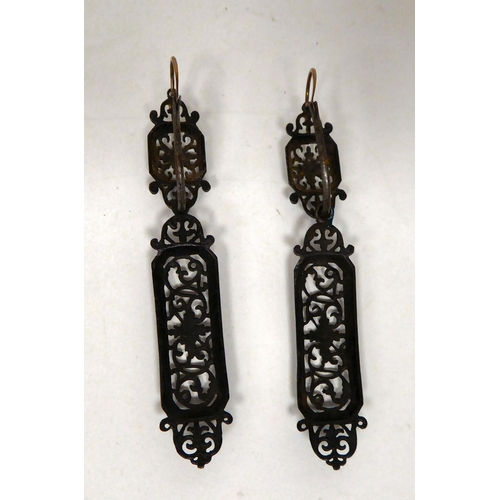 101 - A pair of Berlin iron pendant earrings